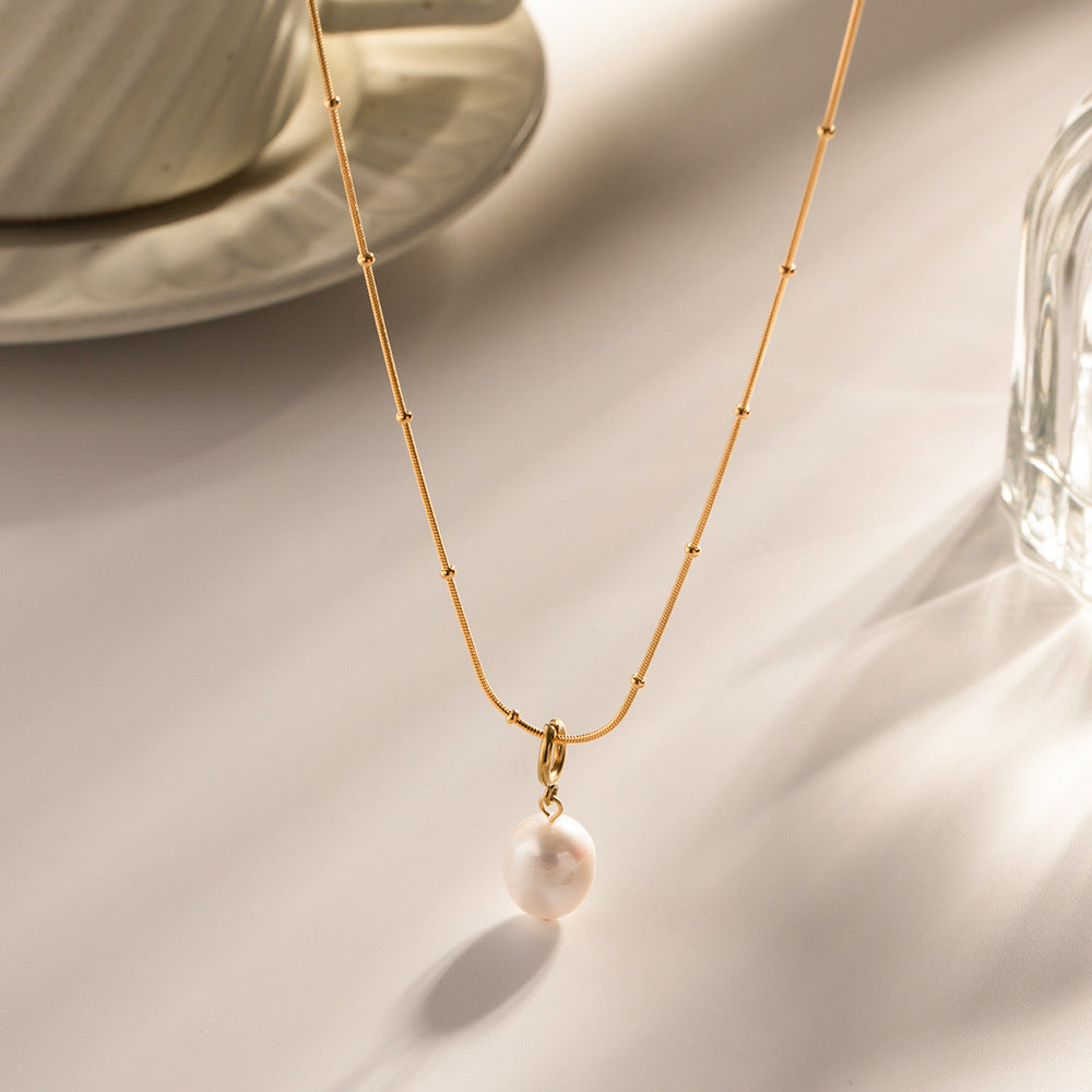 Damen Halskette mit eleganten Perlenanhänger und hochwertiger Edelstahlverarbeitung Shop Nory