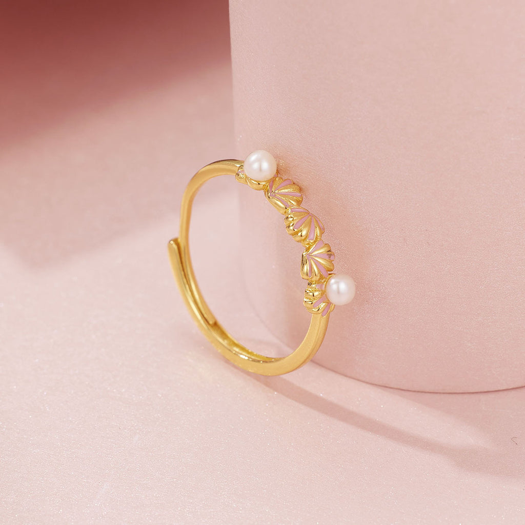 Damen Ring mit perlenschmückendem Blütenmotiv und filigraner Goldverzierung Shop Nory