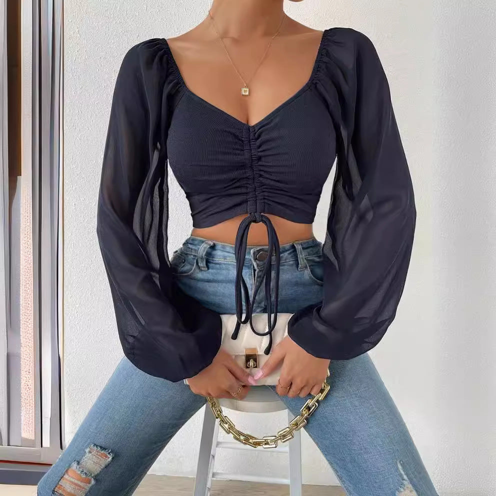 Damen Crop-Top mit strukturiertem Körper und eleganten Puffärmeln