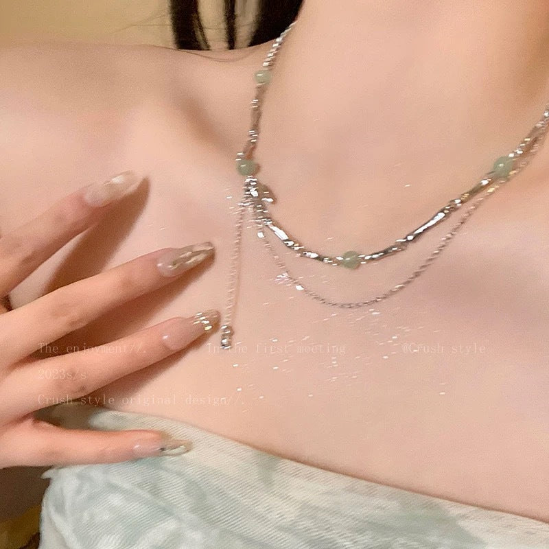 Damen Halskette mit filigranen Gliederketten und eleganten Edelsteinanhängern Shop Nory
