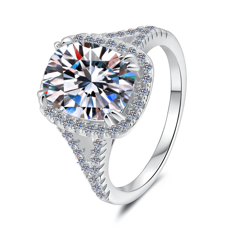 Damen Verlobungsring mit elegantem facettiertem Hauptstein und funkelndem Zirkonia-Besatz Shop Nory