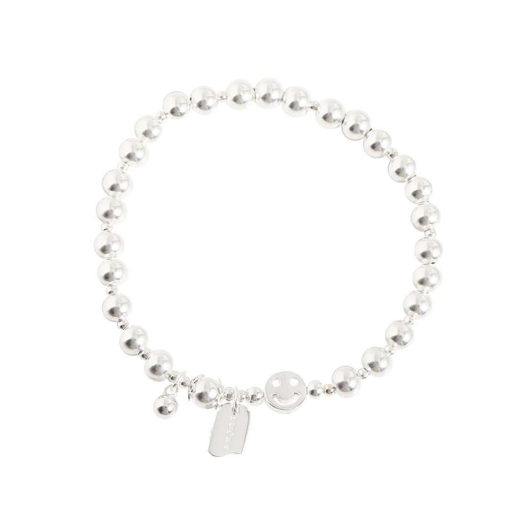 Damen Armreif mit verspieltem Smiley-Anhänger und Perlen Shop Nory