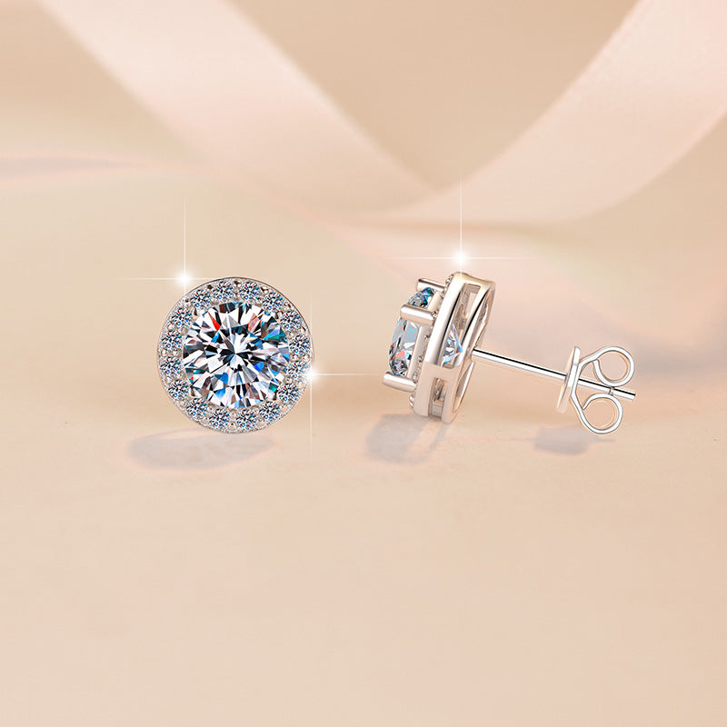 Damen Ohrstecker mit glanzvollen Zirkonia und eleganter Fassung Shop Nory