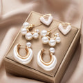 Damen Ohrschmuck Set mit kunstvollen Perlen- und Herzdesigns Shop Nory