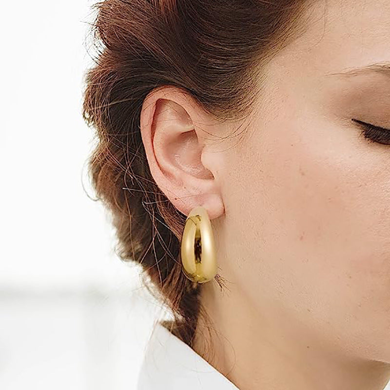 Damen auffällige Creolen mit modernen, geschwungenen Konturen Shop Nory