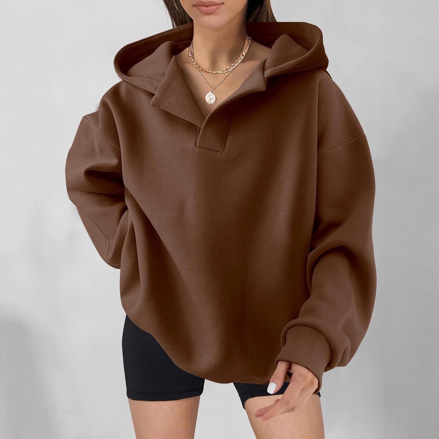 Damen Kapuzensweater mit übergroßem Schnitt und V-Ausschnitt