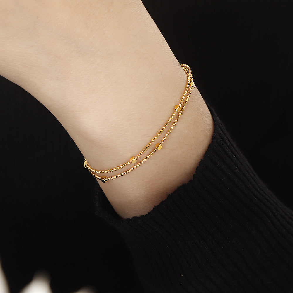Damen zierliches Armband mit doppelter Kettenanordnung und funkelnden Akzenten Shop Nory