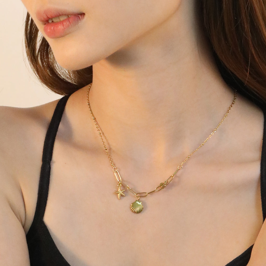 Damen Halskette mit maritimem Muschel- und Sternenanhänger Shop Nory