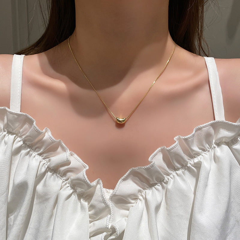 Damen Halskette mit modernem Bohnenanhänger aus hochwertigem Edelstahl Shop Nory