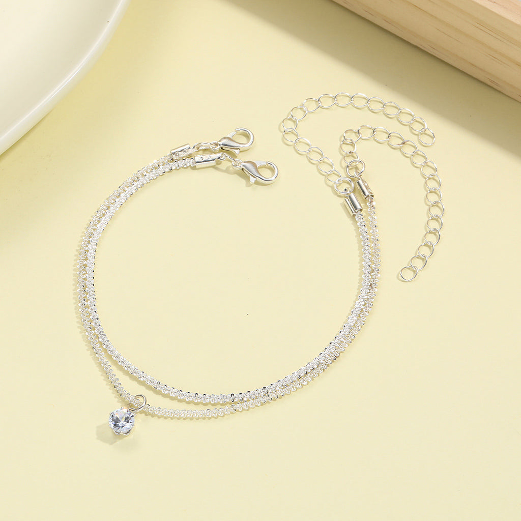 Damen Fußkettchen mit funkelnden Kristallen und eleganten Details Shop Nory