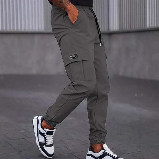 Herren Utility-Cargohose im Joggerstil mit Tunnelzugbund elastischen Beinabschlüssen und Multifachtaschen Shop Nory