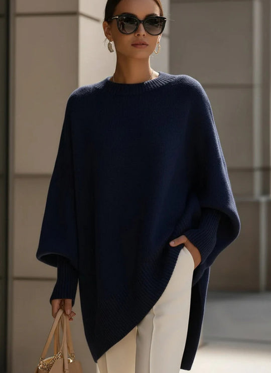Damen nan Oversize Strickponcho mit asymmetrischem Saum und gerippten Ärmeln Shop Nory