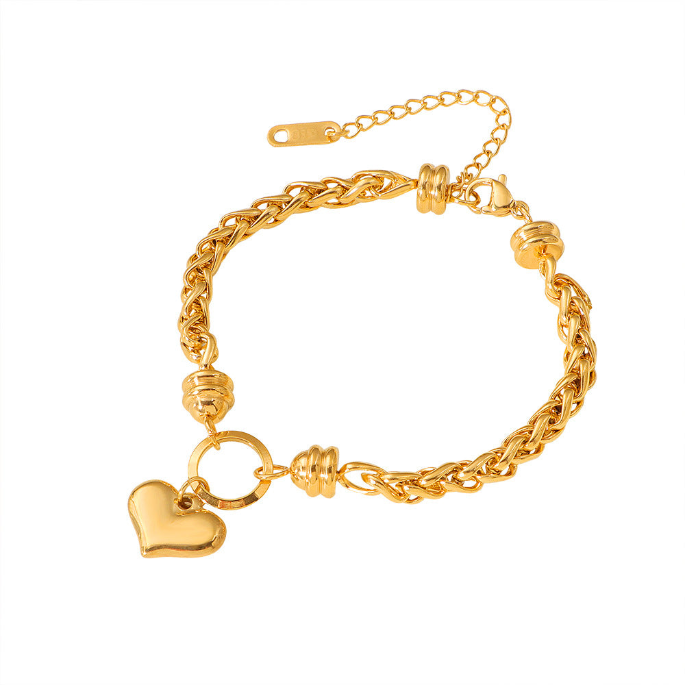 Damen liebevolles Armband mit herzförmigem Anhänger und kunstvollem Geflecht Shop Nory