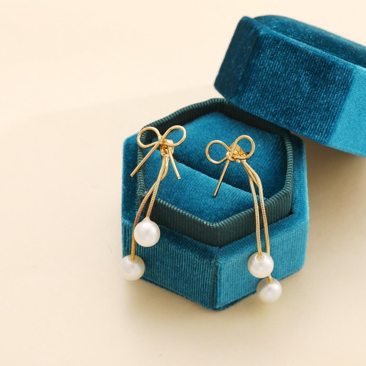 Damen Ohrringe mit elegantem Schleifen- und Perlen-Design Shop Nory