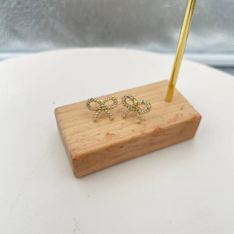 Damen Ohrstecker im Schleifen-Design mit funkelnden Kristallen Shop Nory
