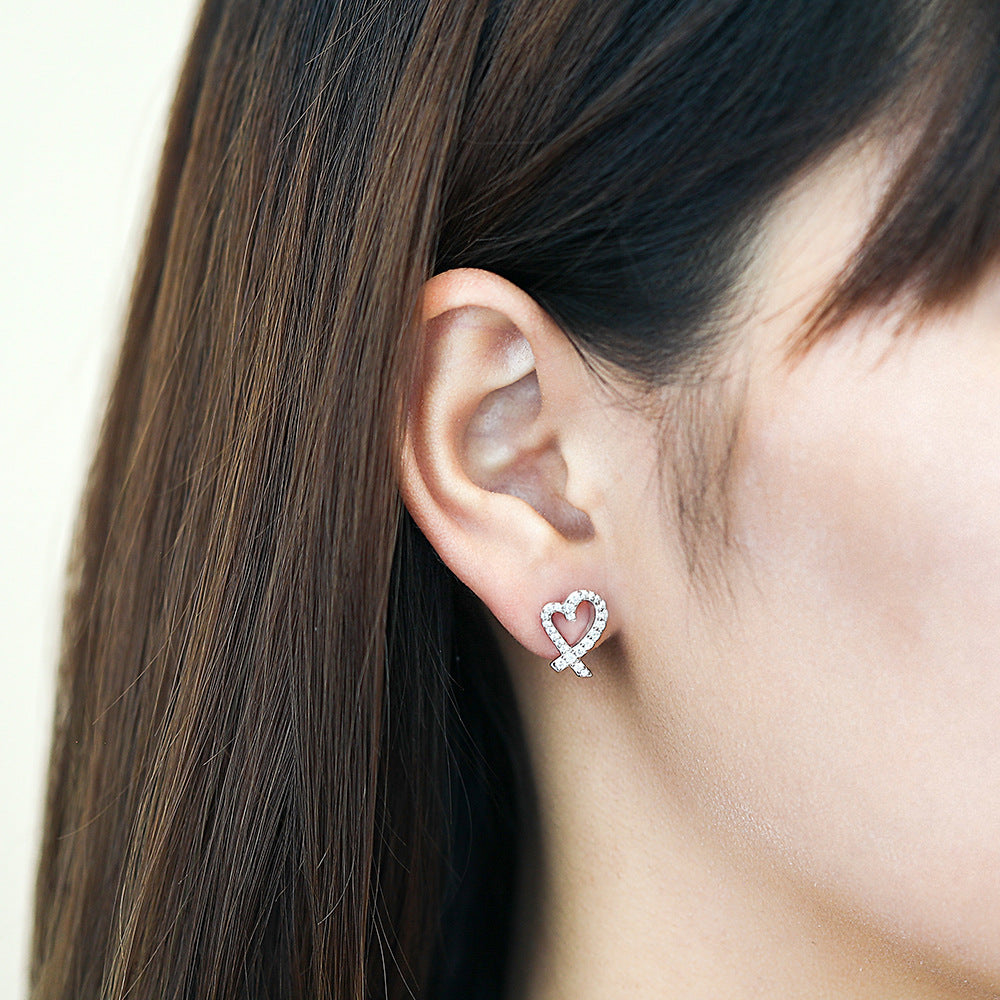 Damen Ohrringe mit Herzdesign und funkelndem Zirkonia-Besatz Shop Nory