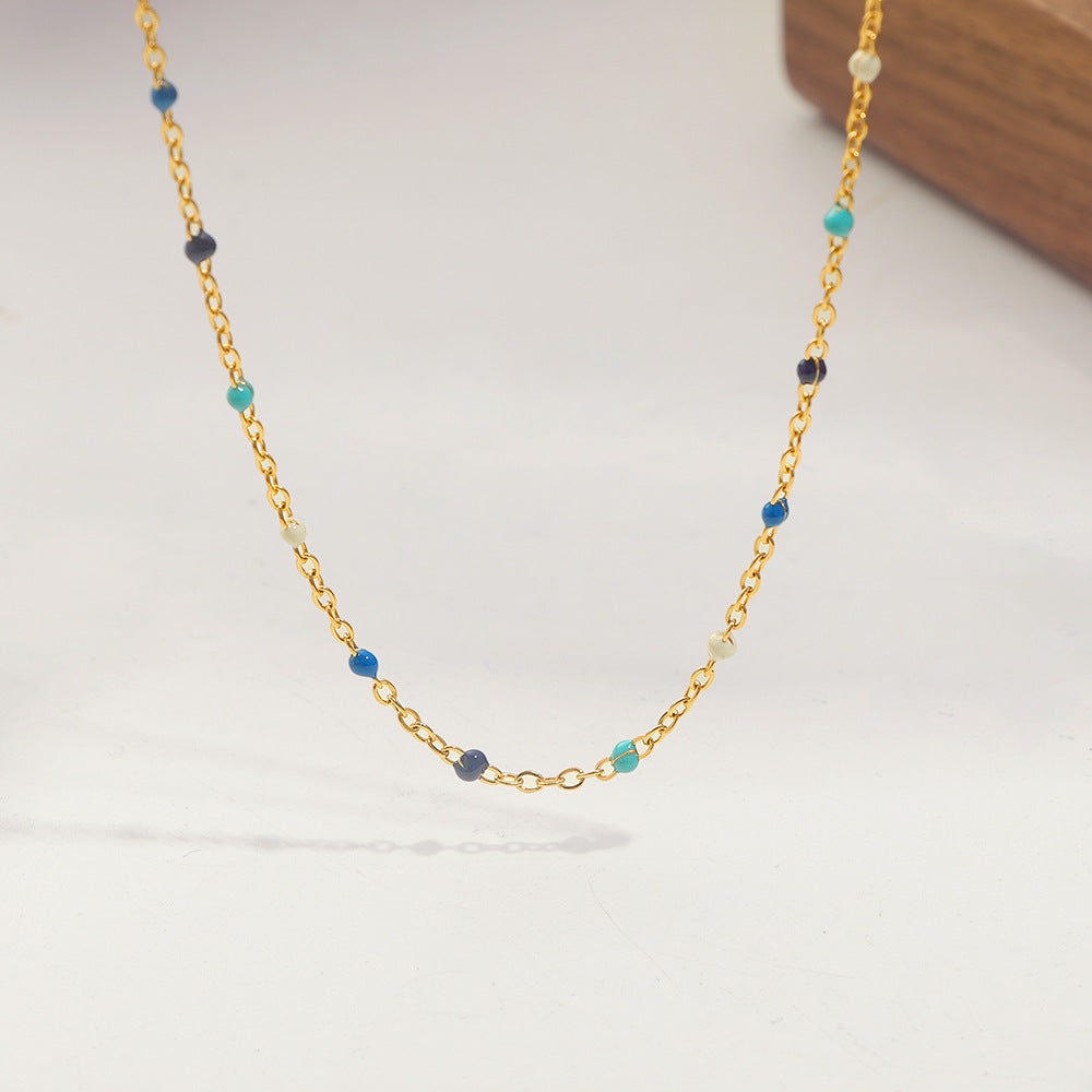 Damen feine Halskette mit bunten Edelstein-Details und goldener Gliederkette Shop Nory