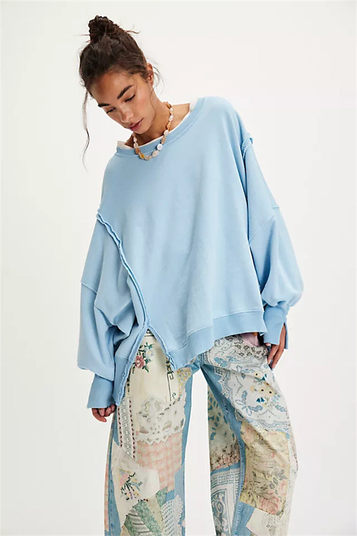 Damen oversized Sweatshirt mit Ballonärmeln, offenen Saumnähten und seitlichen Schlitzen Shop Nory