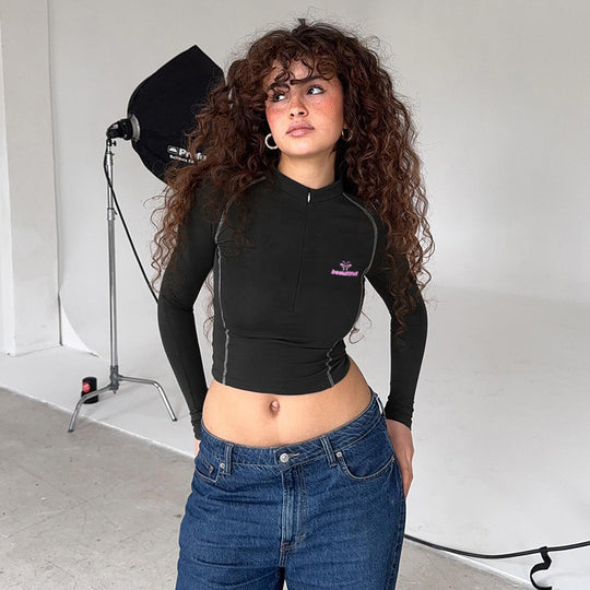 Damen Sportliches tailliertes Langarm-Performance-Shirt mit kurzem Frontreißverschluss Shop Nory