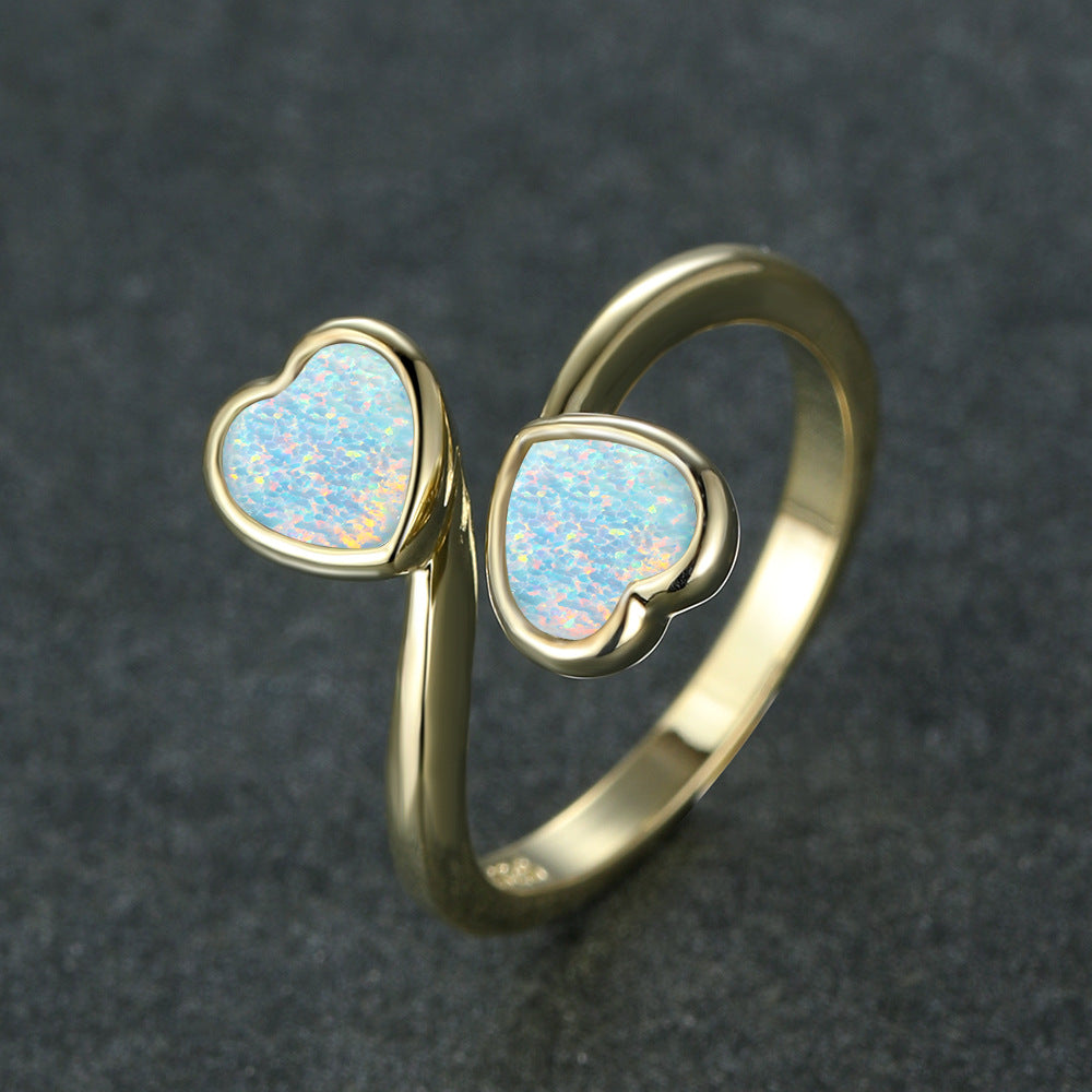 Damen Ring mit strahlendem Herzdesign und leuchtenden Opal-Effekten Shop Nory