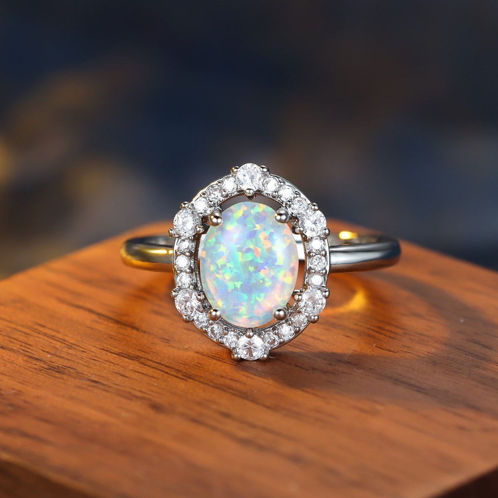 Damen Ring mit funkelndem Opal und eleganter Zirkonia-Verzierung Shop Nory