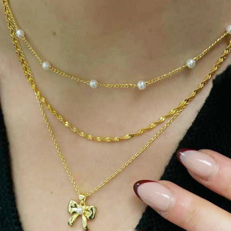 Damen Halskette mit eleganten Perlen und schimmerndem Anhänger Shop Nory