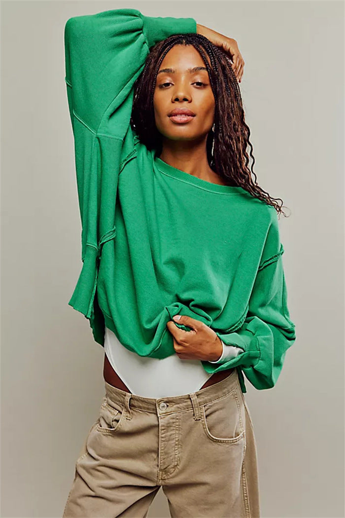 Damen oversized Sweatshirt mit Ballonärmeln, offenen Saumnähten und seitlichen Schlitzen Shop Nory