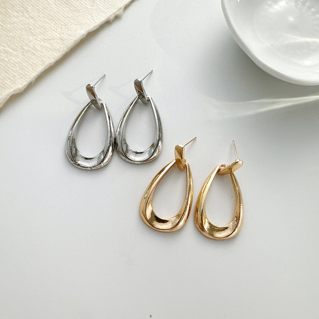 Damen Creolen mit einzigartigem geschwungenem Design Shop Nory