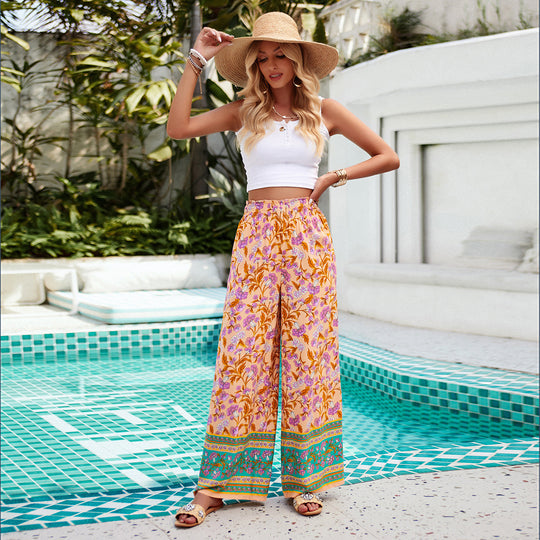 Damen nan weite Palazzohose mit gerafftem Bund, seitlichen Eingrifftaschen und floraler Boho-Print Shop Nory