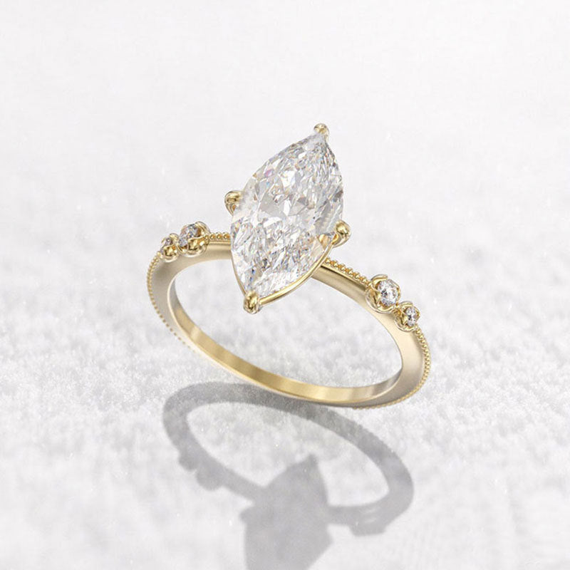 Damen Eleganter Ring mit marquise-förmigem Stein und funkelnden Akzenten Shop Nory