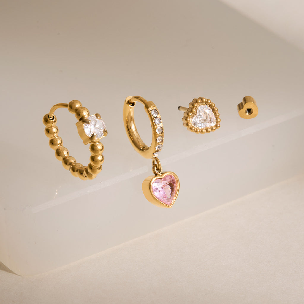 Damen Ohrhänger mit funkelnden Herzanhängern und stylishem Perlendekor Shop Nory