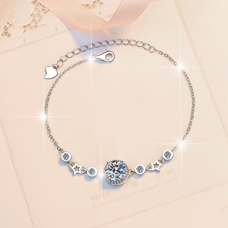 Damenarmband mit strahlendem Kristall und funkelnden Sternen Shop Nory