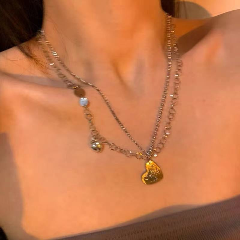 Damen Kette mit harmonischem Layering-Design und verspielten Anhängern Shop Nory