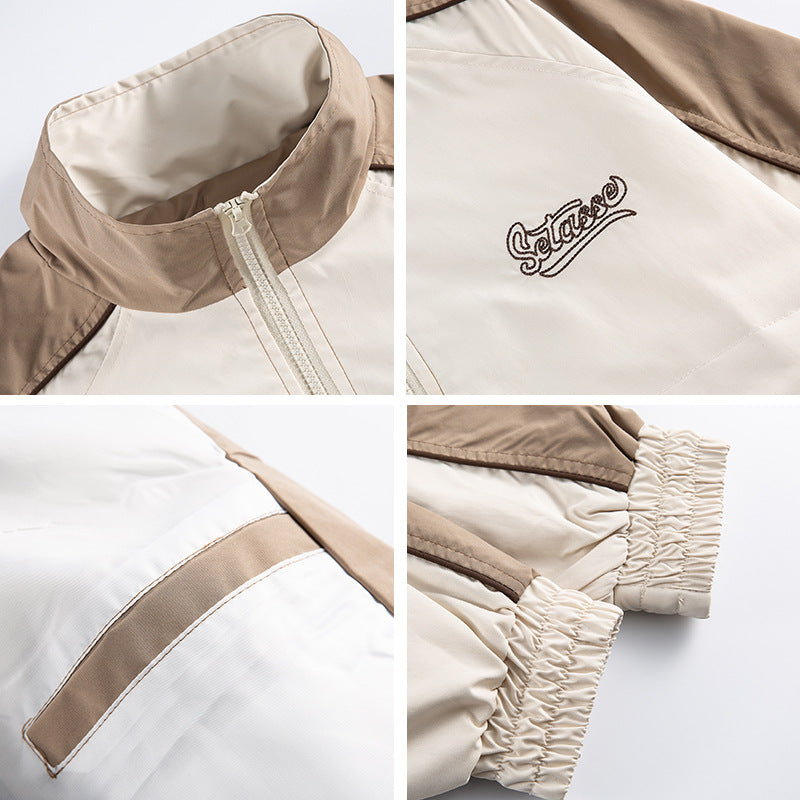 Unisex Kastig geschnittene Trackjacke im Retro-Sportstil mit hohem Stehkragen, Farbblock‑Einsätzen und elastischem Saum Shop Nory