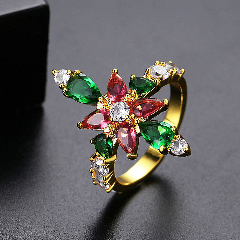 Damenring mit kunstvollem Blumenmuster und funkelnden Edelsteinen Shop Nory