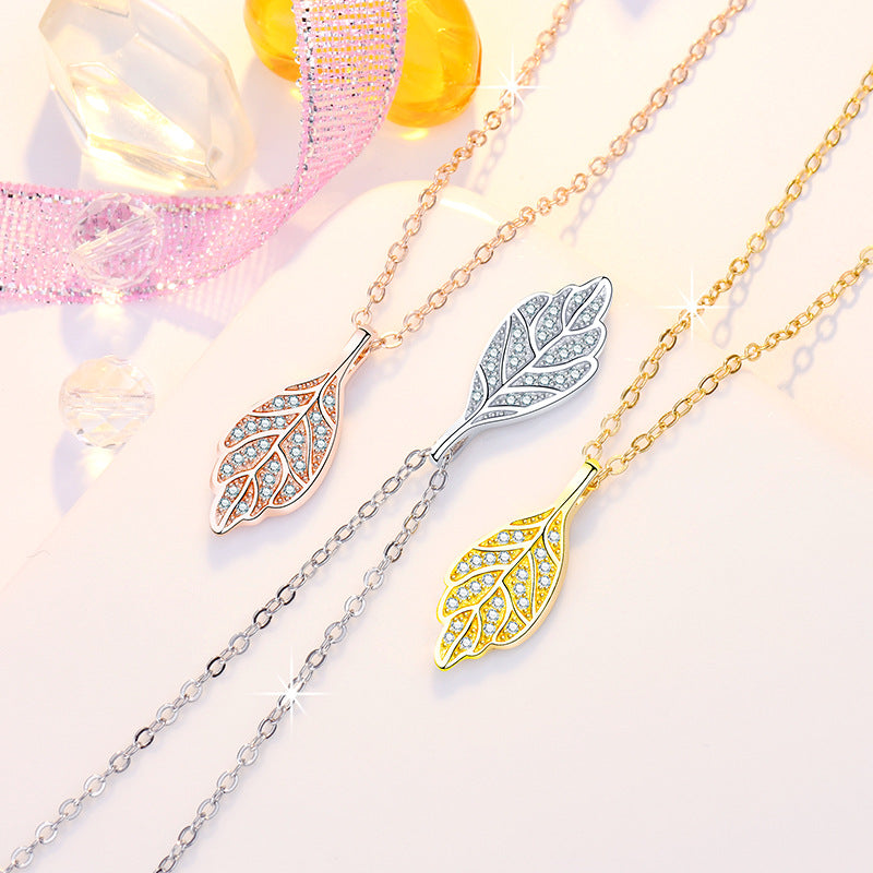 Damen Halskette mit filigranem Blätterdesign und funkelnden Zirkonia Shop Nory