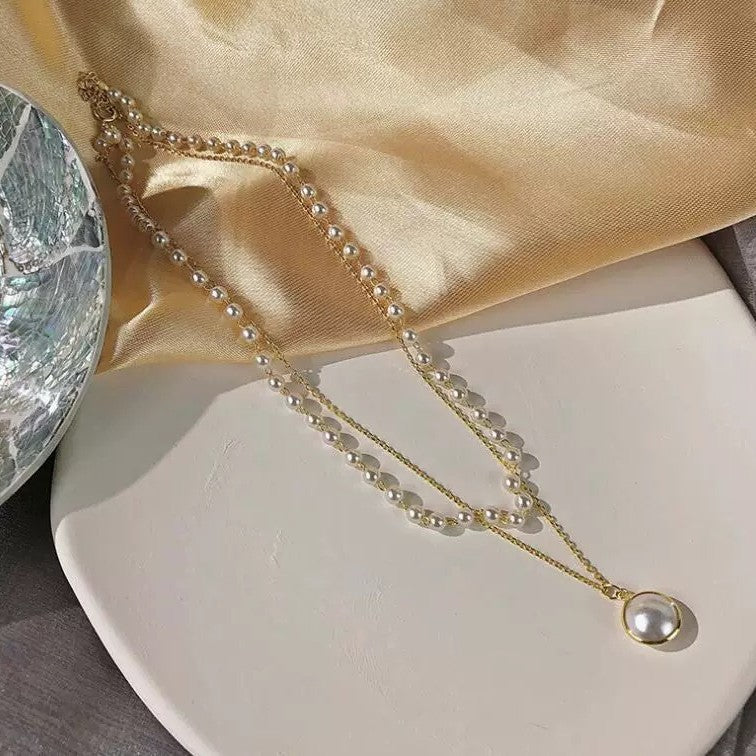Damen Charmante und mehrlagige Perlenhalskette Shop Nory