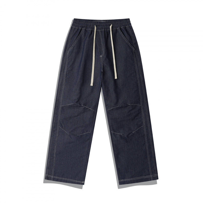 Unisex Weite Denim-Hose mit elastischem Bund, Kordelzug und gesteppter Kniepasse Shop Nory