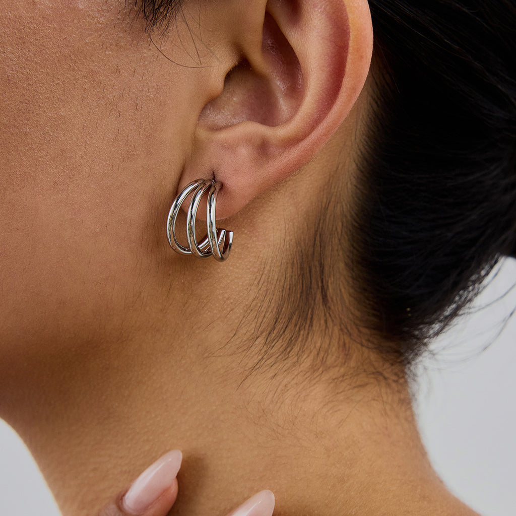 Damen Creolen Ohrhänger mit elegantem geschwungenem Design Shop Nory