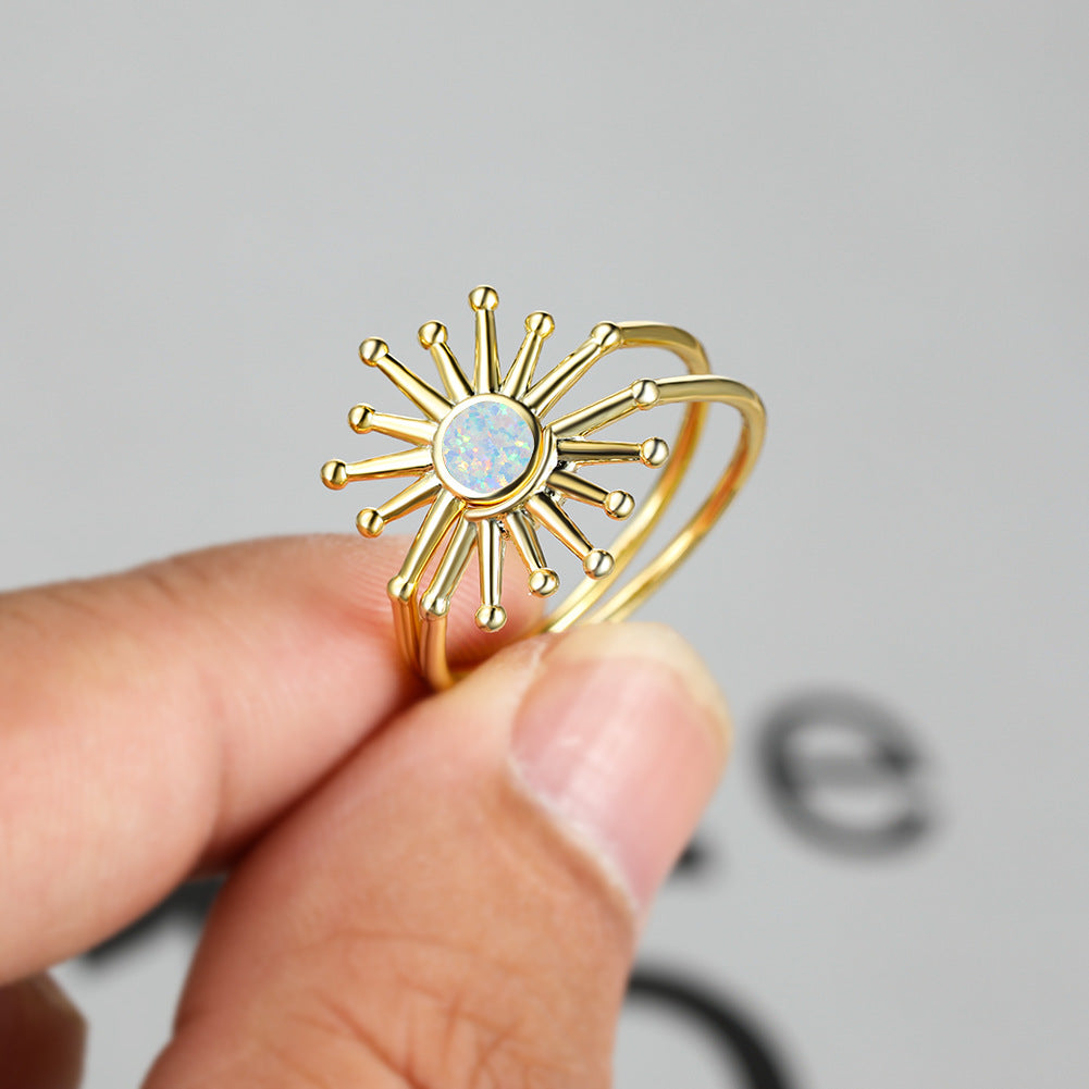 Damen Ring mit kunstvollem Sonnen-Design und schimmerndem Opal Shop Nory