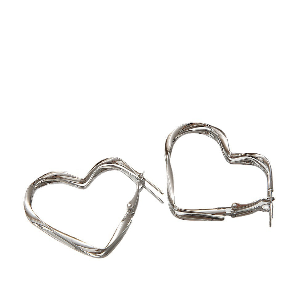 Damen Ohrringe in einzigartigem, geschwungenem Design Shop Nory