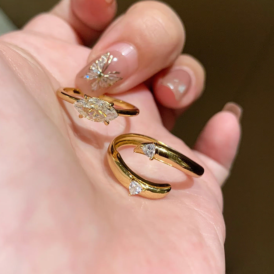 Damen Zierlicher Ring mit ovalem, funkelndem Edelstein und filigraner Goldfassung Shop Nory