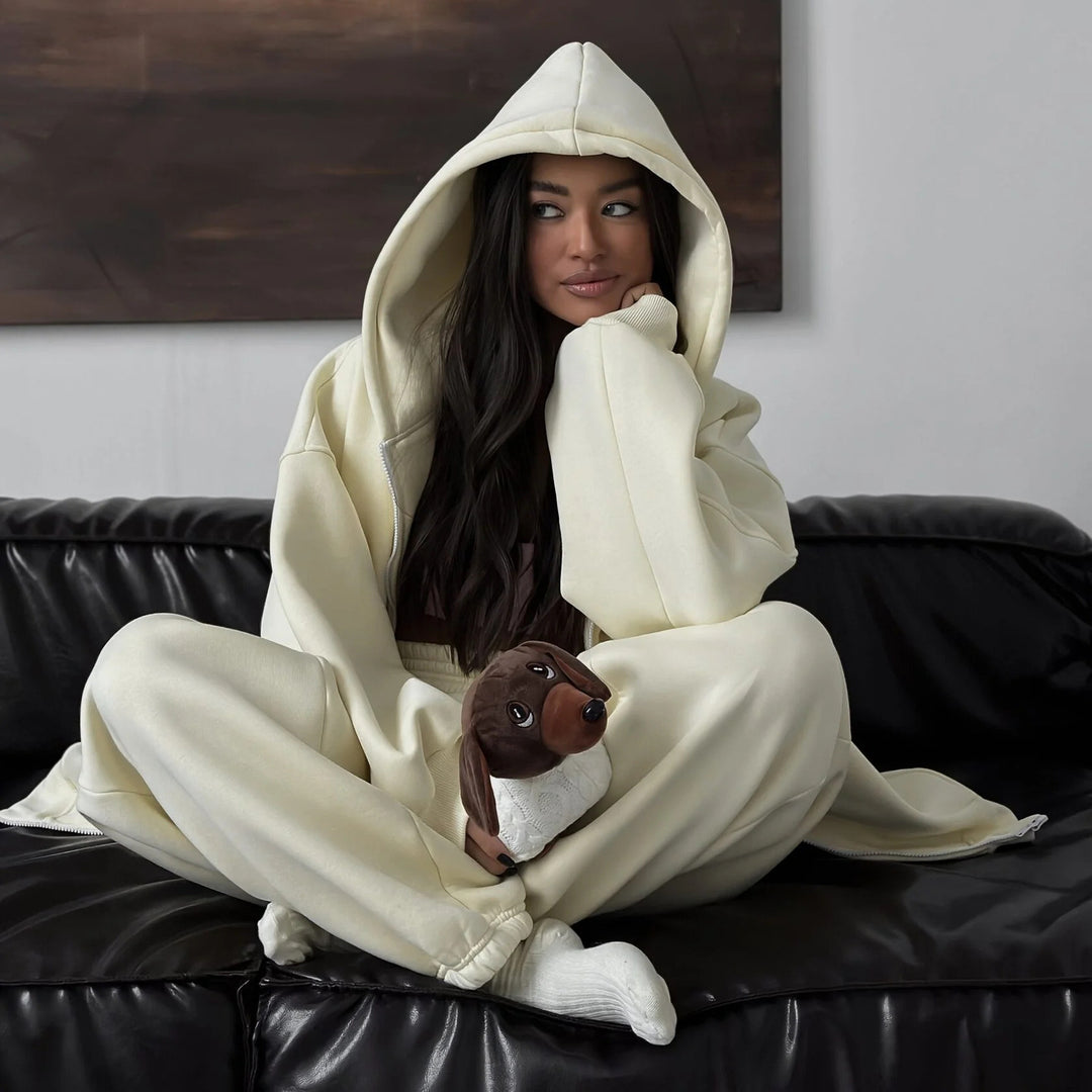 Damen Oversize-Kapuzenjacke mit verdecktem Reißverschluss und komfortabler Scuba-Optik Shop Nory