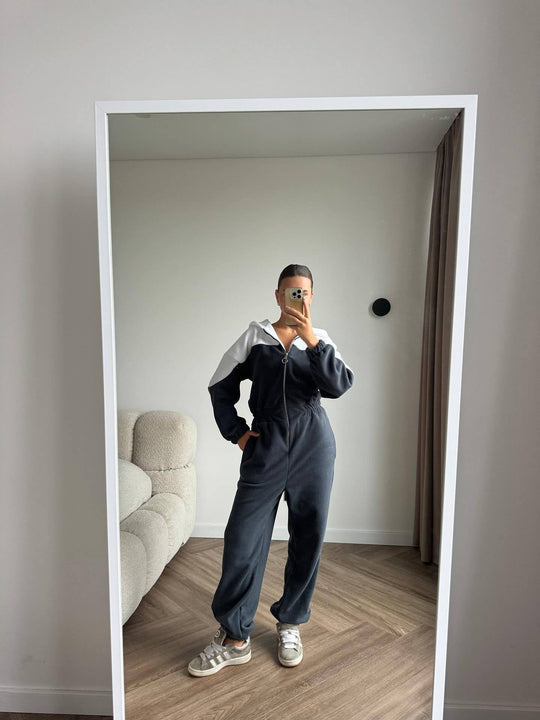 Damen gemütlicher Fleece-Overall mit Kapuze, durchgehendem Reißverschluss und elastischen Bündchen Shop Nory