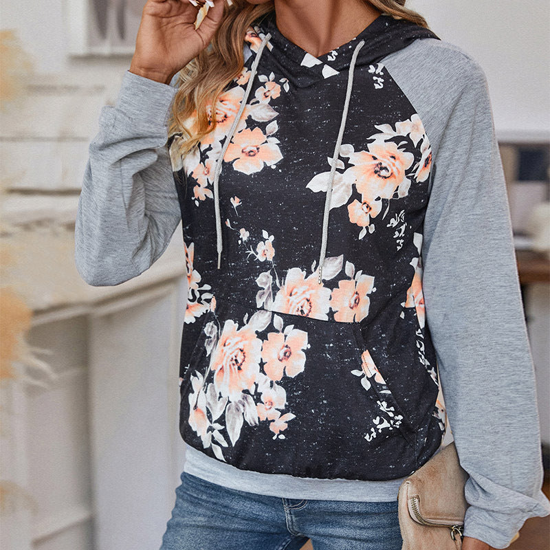 Damen Lässiger Kapuzenpullover mit floralem Print, Raglanärmeln und Kängurutasche Shop Nory