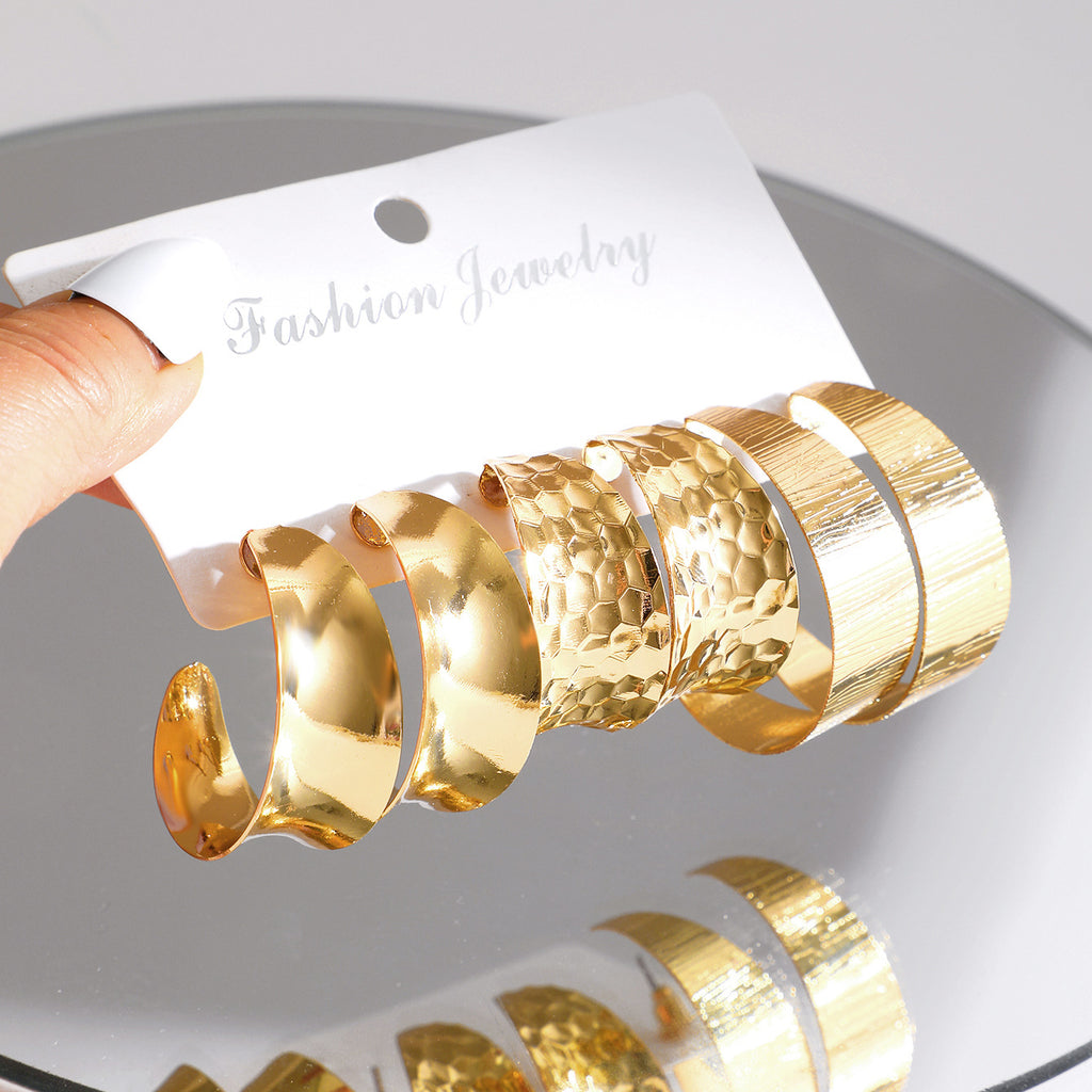 Damen Creolen Ohrringe Set aus hochwertiger, glänzender Metalloberfläche Shop Nory
