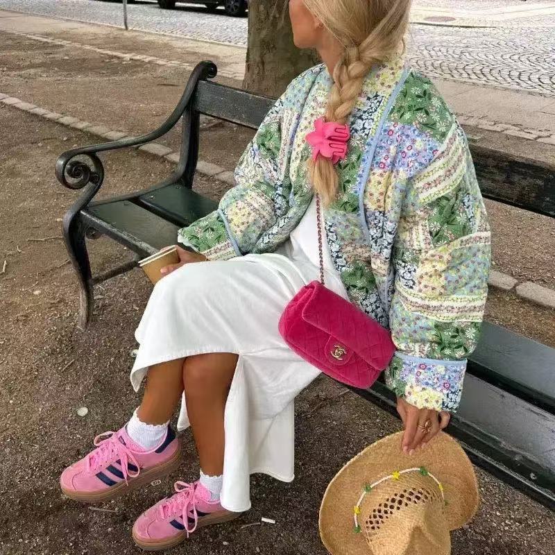 Damen Kurz geschnittene gesteppte Patchworkjacke mit aufgesetzten Taschen Shop Nory
