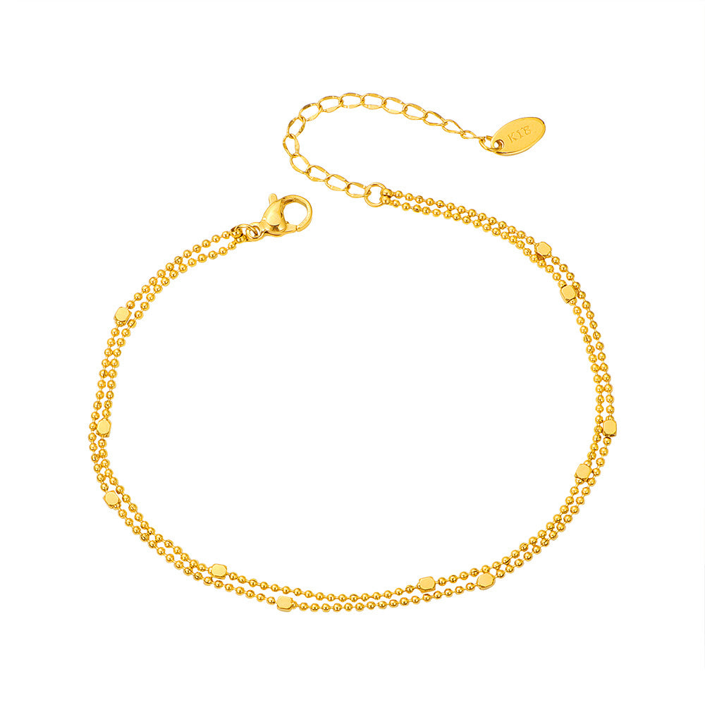 Damen Fußkette aus feinen Glieder und goldfarbenen Akzenten Shop Nory