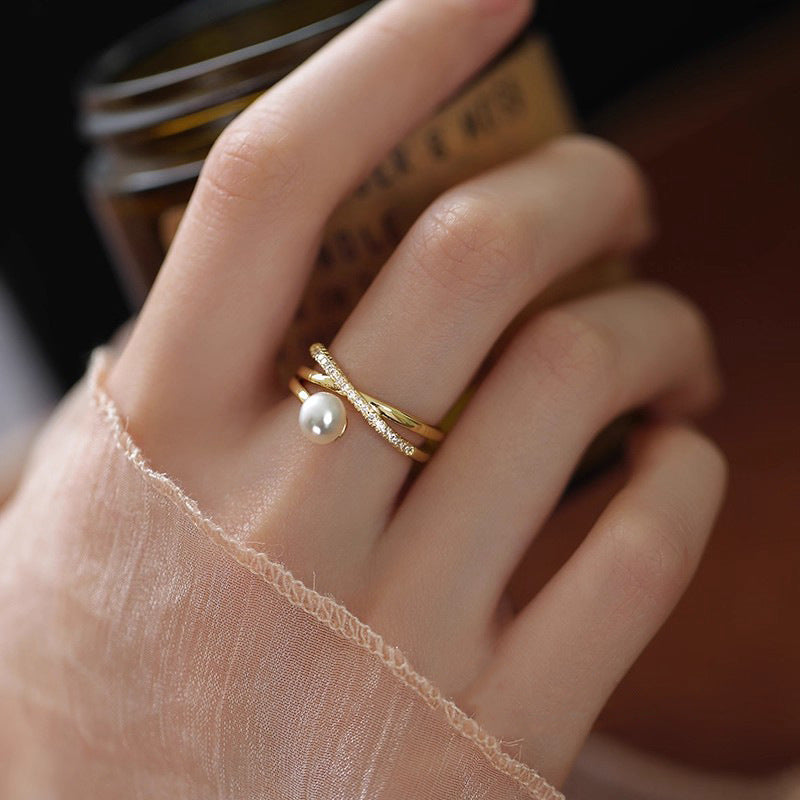 Damen Zierlicher Ring mit geschwungenem Design und Perle Shop Nory