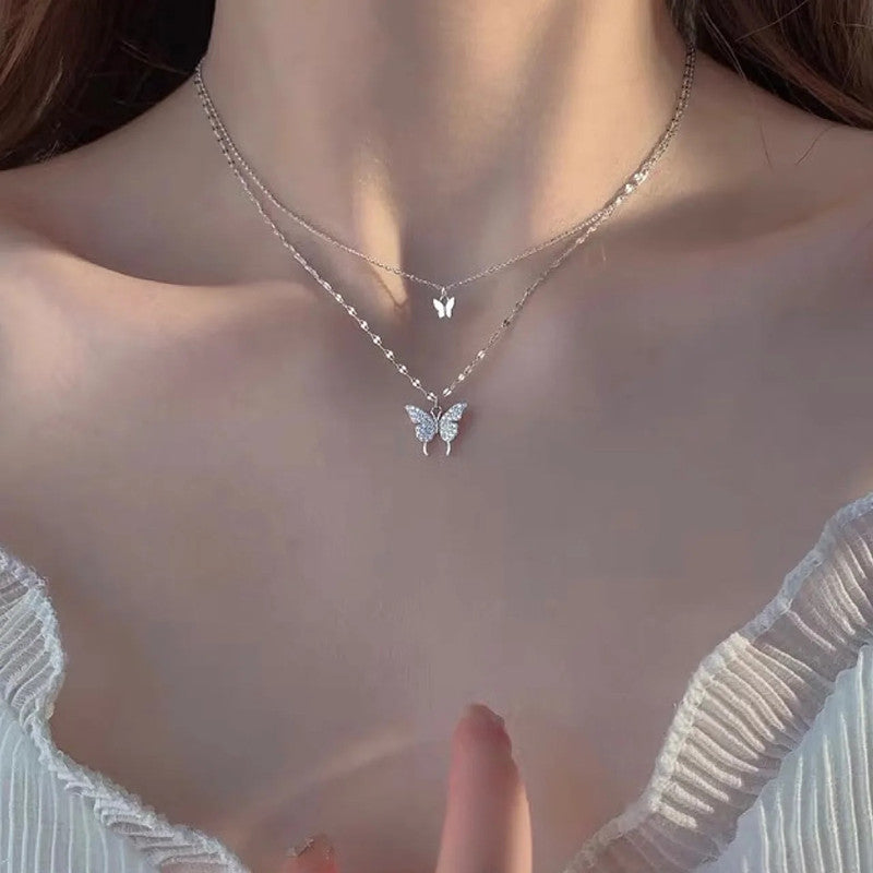 Damen Halskette mit filigranem Schmetterlings-Design und funkelnden Zirkonia Shop Nory